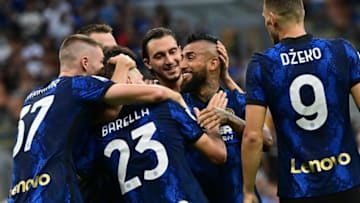 Inter Milan's Chilean midfielder Arturo Vidal (C) celebrates with teammates after he scored the third goal during the Italian Serie A football match Inter Milan vs Genoa at San Siro stadium in Milan, on August 21, 2021. (Photo by MIGUEL MEDINA / AFP) (Photo by MIGUEL MEDINA/AFP via Getty Images)