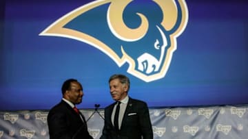 LOS ANGELES, CA - JANUARY 15: Inglewood Mayor James Butts, Jr. left, greets Los Angeles Rams owner Stan Kroenke at a press conference held at Forum to celebrate and welcome team to Los Angeles. (Photo by Irfan Khan/Los Angeles Times via Getty Images)