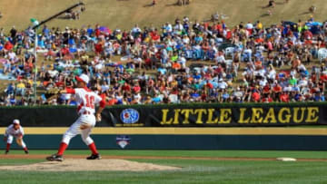 Aug 25, 2013; Williamsport, PA, USA; Japan pitcher Kazuki Ishida (10) throws a pitch to the plate during the fourth inning against California (West) during the Little League World Series Championship game at Lamade Stadium. Mandatory Credit: Matthew O