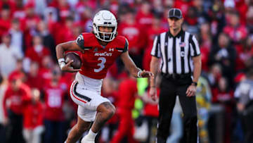 Cincinnati Bearcats quarterback Evan Prater runs with the ball against the South Florida Bulls at Nippert Stadium. USA Today.