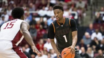 Dec 19, 2015; Stanford, CA, USA; Texas Longhorns guard Isaiah Taylor (1) dribbles against Stanford Cardinal guard Marcus Allen (15) in the 2nd half at Maples Pavilion. Mandatory Credit: John Hefti-USA TODAY Sports. Texas won 75-73.