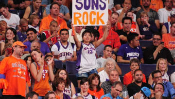 PHOENIX - APRIL 26: A Suns fan holds a poster as the Phoenix Suns take on the Portland Trail Blazers in Game Five of the Western Conference Quarterfinals during the 2010 NBA Playoffs on April 26, 2010 at US Airways Center in Phoenix, Arizona. The Suns won 107-88. NOTE TO USER: User expressly acknowledges and agrees that, by downloading and/or using this Photograph, user is consenting to the terms and conditions of the Getty Images License Agreement. Mandatory Copyright Notice: Copyright 2010 NBAE (Photo by Barry Gossage/NBAE via Getty Images)