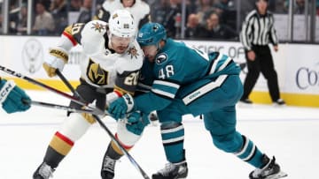 SAN JOSE, CALIFORNIA - OCTOBER 12: Chandler Stephenson #20 of the Vegas Golden Knights and Tomas Hertl #48 of the San Jose Sharks go for the puck in the third period at SAP Center on October 12, 2023 in San Jose, California. (Photo by Ezra Shaw/Getty Images)