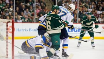 Mar 6, 2016; Saint Paul, MN, USA; Minnesota Wild forward Jason Zucker (16) screens St. Louis Blues goalie Jake Allen (34) in the second period at Xcel Energy Center. Mandatory Credit: Brad Rempel-USA TODAY Sports