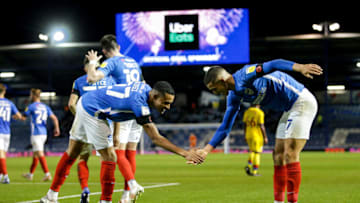 PORTSMOUTH, ENGLAND - NOVEMBER 09: Gassan Ahadme of Portsmouth FC celebrates after he scores a goal to make it 2-0 with team-mate Miguel Azeez during the Papa John's Trophy match between Portsmouth and Crystal Palace U21 at Fratton Park on November 09, 2021 in Portsmouth, England. (Photo by Robin Jones/Getty Images)