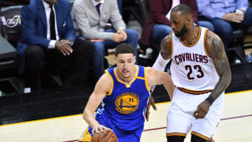 CLEVELAND, OH - JUNE 07: Klay Thompson #11 of the Golden State Warriors is defended by LeBron James #23 of the Cleveland Cavaliers during the second half in Game 3 of the 2017 NBA Finals at Quicken Loans Arena on June 7, 2017 in Cleveland, Ohio. NOTE TO USER: User expressly acknowledges and agrees that, by downloading and or using this photograph, User is consenting to the terms and conditions of the Getty Images License Agreement. (Photo by Jason Miller/Getty Images)