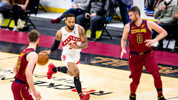 CLEVELAND, OH - APRIL 10: Gary Trent Jr. #33 of the Toronto Raptors dribbles down the court at Rocket Mortgage FieldHouse on April 10, 2021 in Cleveland, Ohio. NOTE TO USER: User expressly acknowledges and agrees that, by downloading and/or using this Photograph, user is consenting to the terms and conditions of the Getty Images License Agreement. (Photo by Lauren Bacho/Getty Images)