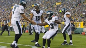 Aug 29, 2015; Green Bay, WI, USA; Philadelphia Eagles running back Darren Sproles (43) celebrates with quarterback Sam Bradford (7) after catching a touchdown pass during the first quarter against the Green Bay Packers at Lambeau Field. Mandatory Credit: Jeff Hanisch-USA TODAY Sports