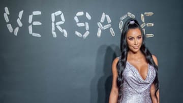 NEW YORK, NEW YORK - DECEMBER 02: Kanye West and Kim Kardashian West attend the the Versace fall 2019 fashion show at the American Stock Exchange Building in lower Manhattan on December 02, 2018 in New York City. (Photo by Roy Rochlin/Getty Images)