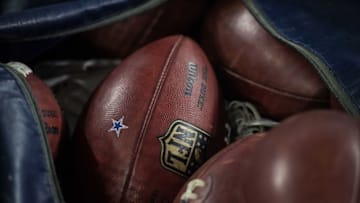 Aug 19, 2016; Arlington, TX, USA; A view of NFL footballs and the Dallas Cowboys logo during the game between the Cowboys and the Miami Dolphins at AT&T Stadium. The Cowboys defeat the Dolphins 41-14. Mandatory Credit: Jerome Miron-USA TODAY Sports