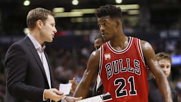 Jan 3, 2016; Toronto, Ontario, CAN; Chicago Bulls head coach Fred Hoiberg talks with Chicago Bulls guard Jimmy Butler (21) during a time out against the Toronto Raptors at the Air Canada Centre. Chicago defeated Toronto 115-113. Mandatory Credit: John E. Sokolowski-USA TODAY Sports