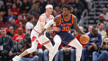 Dec 14, 2022; Chicago, Illinois, USA; Chicago Bulls guard Alex Caruso (6) defends against New York Knicks forward Julius Randle (30) during the first half at United Center. Mandatory Credit: Kamil Krzaczynski-USA TODAY Sports