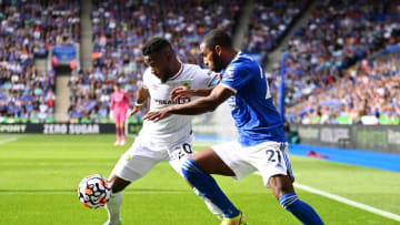 Maxwel Cornet of Burnley battles for possession with Ricardo Pereira of Leicester City (Photo by Clive Mason/Getty Images)