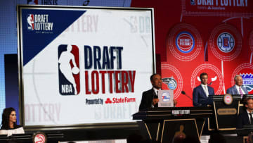 CHICAGO - MAY 15: NBA Deputy Commissioner, Mark Tatum awards the Philadelphia 76ers the number ten pick in the 2018 NBA Draft during the 2018 NBA Draft Lottery at the Palmer House Hotel on May 15, 2018 in Chicago Illinois. NOTE TO USER: User expressly acknowledges and agrees that, by downloading and/or using this photograph, user is consenting to the terms and conditions of the Getty Images License Agreement. Mandatory Copyright Notice: Copyright 2018 NBAE (Photo by Jeff Haynes/NBAE via Getty Images)
