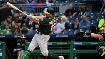 PITTSBURGH, PA - MAY 04: Kendrys Morales #12 of the Oakland Athletics hits an RBI triple to right field in the first inning during the game against the Pittsburgh Pirates at PNC Park on May 4, 2019 in Pittsburgh, Pennsylvania. (Photo by Justin Berl/Getty Images)