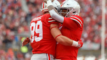 COLUMBUS, OH - SEPTEMBER 08: Tight end Luke Farrell (89) of the Ohio State Buckeyes celebrates with Quarterback Dwayne Haskins Jr. (7) of the Ohio State Buckeyes after scoring a touchdown in a game between the Ohio State Buckeyes and the Rutgers Scarlet Nights on September 08, 2018 at Ohio Stadium in Columbus, Ohio. (Photo by Adam Lacy/Icon Sportswire via Getty Images)