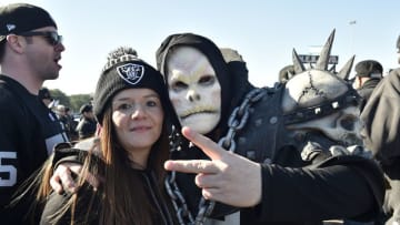 Jan 7, 2017; Houston, TX, USA; Oakland Raiders fan Carlos Sandoval poses with a friend before the AFC Wild Card playoff football game against the Houston Texans at NRG Stadium. Mandatory Credit: Jerome Miron-USA TODAY Sports