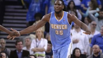 April 10, 2014; Oakland, CA, USA; Denver Nuggets forward Kenneth Faried (35) celebrates against the Golden State Warriors during the fourth quarter at Oracle Arena. The Nuggets defeated the Warriors 100-99. Mandatory Credit: Kyle Terada-USA TODAY Sports