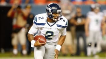 Aug 7, 2014; Denver, CO, USA; Seattle Seahawks quarterback Terrelle Pryor (2) during the first half against the Denver Broncos at Sports Authority Field at Mile High. Mandatory Credit: Chris Humphreys-USA TODAY Sports