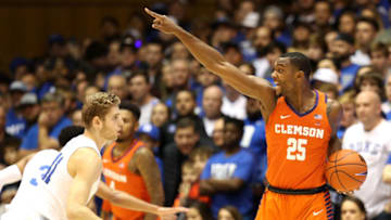 DURHAM, NORTH CAROLINA - JANUARY 05: Aamir Simms #25 of the Clemson Tigers reacts against Jack White #41 of the Duke Blue Devils during their game at Cameron Indoor Stadium on January 05, 2019 in Durham, North Carolina. (Photo by Streeter Lecka/Getty Images)