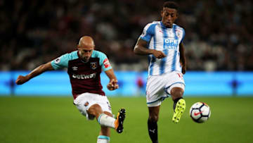LONDON, ENGLAND - SEPTEMBER 11: Pablo Zabaleta of West Ham United beats Rajiv van La Parra of Huddersfield Town during the Premier League match between West Ham United and Huddersfield Town at London Stadium on September 11, 2017 in London, England. (Photo by Julian Finney/Getty Images)