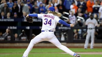 Oct 5, 2016; New York City, NY, USA; New York Mets starting pitcher Noah Syndergaard (34) throws during the first inning against the San Francisco Giants in the National League wild card playoff baseball game at Citi Field. Mandatory Credit: Anthony Gruppuso-USA TODAY Sports