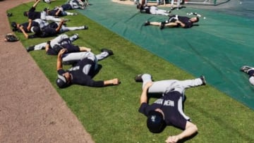 Mar 31, 2015; Fort Myers, FL, USA; New York Yankees players stretch before the start of the spring training game against the Minnesota Twins at CenturyLink Sports Complex. Mandatory Credit: Jonathan Dyer-USA TODAY Sports