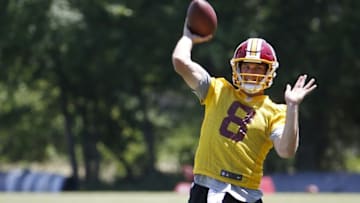 Jun 14, 2016; Ashburn, VA, USA; Washington Redskins quarterback Kirk Cousins (8) throws the ball during drills as part of day one of minicamp at Redskins Park. Mandatory Credit: Geoff Burke-USA TODAY Sports
