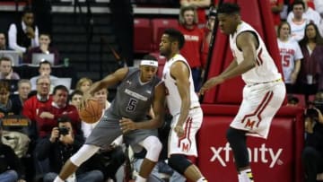 Jan 19, 2016; College Park, MD, USA; Northwestern Wildcats center Derek Pardon (5) defended by forward Damonte Dodd (35) Maryland Terrapins at Xfinity Center. Mandatory Credit: Mitch Stringer-USA TODAY Sports