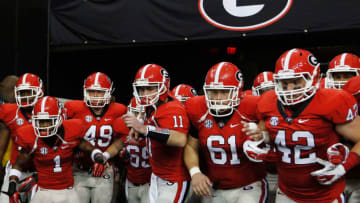ATLANTA, GA - DECEMBER 01: Members of the Georgia Bulldogs take the field before the start of their SEC Championship Game against the Alabama Crimson Tide at the Georgia Dome on December 1, 2012 in Atlanta, Georgia. (Photo by Kevin C. Cox/Getty Images)