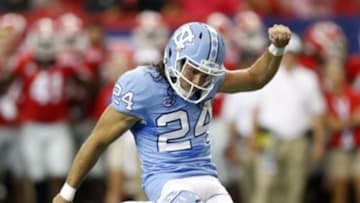 Sep 3, 2016; Atlanta, GA, USA; North Carolina Tar Heels place kicker Nick Weiler (24) kicks an extra point against the Georgia Bulldogs during the second quarter of the 2016 Chick-Fil-A Kickoff game at Georgia Dome. Mandatory Credit: Brett Davis-USA TODAY Sports