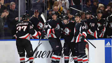 Feb 26, 2023; Buffalo, New York, USA; Buffalo Sabres center Dylan Cozens (24) celebrates his goal with teammates during the second period against the Washington Capitals at KeyBank Center. Mandatory Credit: Timothy T. Ludwig-USA TODAY Sports