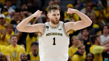 Nov 11, 2022; Detroit, Michigan, USA; Michigan Wolverines center Hunter Dickinson (1) celebrates during the second half against the Eastern Michigan Eagles at Little Caesars Arena. Mandatory Credit: Rick Osentoski-USA TODAY Sports