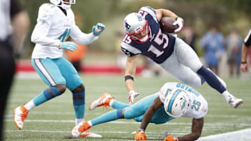 Sep 18, 2016; Foxborough, MA, USA; New England Patriots wide receiver Chris Hogan (15) is tackled by Miami Dolphins cornerback Xavien Howard (25) during the fourth quarter at Gillette Stadium. The New England Patriots won 31-24. Mandatory Credit: Greg M. Cooper-USA TODAY Sports