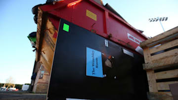 HIGH WYCOMBE, ENGLAND - JANUARY 09: A discarded door featuring the name The Wembley Room lays new to a skip during the FA Cup Third Round match between Wycombe Wanderers and Preston North End at Adams Park on January 9, 2021 in High Wycombe, England. The match will be played without fans, behind closed doors as a Covid-19 precaution. (Photo by Marc Atkins/Getty Images)