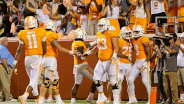 Sep 1, 2016; Knoxville, TN, USA; Tennessee Volunteers wide receiver Josh Malone (3) is congratulated by teammates after scoring a touchdown against the Appalachian State Mountaineers during the second half at Neyland Stadium. Tennessee won in overtime 20 to 13. Mandatory Credit: Randy Sartin-USA TODAY Sports