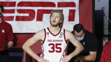 Mar 4, 2021; Norman, Oklahoma, USA; Oklahoma Sooners forward Brady Manek (35) watches an introduction video before a game against the Texas Longhorns at Lloyd Noble Center. Mandatory Credit: Alonzo Adams-USA TODAY Sports