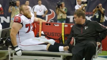 Aug 16, 2014; Houston, TX, USA; Atlanta Falcons tackle Sam Baker (72) is taken off the field on a cart with a leg injury against the Houston Texans at NRG Stadium. Mandatory Credit: Kirby Lee-USA TODAY Sports