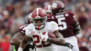 Alabama running back Najee Harris (22) breaks through the Texas A&M line during the second half of Alabama's 47-28 victory at Kyle Field Saturday, Oct. 12, 2019 in College Station, Texas. [Staff Photo/Gary Cosby Jr.]Alabama Vs Texas A M