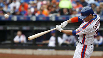 May 22, 2016; New York City, NY, USA; New York Mets left fielder Michael Conforto (30) hits a home run in the first inning against the Milwaukee Brewers at Citi Field. Mandatory Credit: Noah K. Murray-USA TODAY Sports