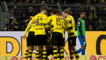 DORTMUND, GERMANY - DECEMBER 16: Christian Pulisic of Dortmund celebrates after scoring his team`s second goal with team mates during the Bundesliga match between Borussia Dortmund and TSG 1899 Hoffenheim at Signal Iduna Park on December 16, 2017 in Dortmund, Germany. (Photo by TF-Images/TF-Images via Getty Images)