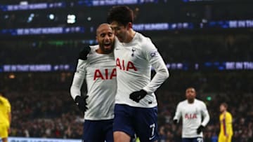 Tottenham Hotspur's South Korean striker Son Heung-Min (centre right) celebrates with Tottenham Hotspur's Brazilian midfielder Lucas Moura (L) after scoring their third goal during the English Premier League football match between Tottenham Hotspur and Crystal Palace at Tottenham Hotspur Stadium in London, on December 26, 2021. - - RESTRICTED TO EDITORIAL USE. No use with unauthorized audio, video, data, fixture lists, club/league logos or 'live' services. Online in-match use limited to 120 images. An additional 40 images may be used in extra time. No video emulation. Social media in-match use limited to 120 images. An additional 40 images may be used in extra time. No use in betting publications, games or single club/league/player publications. (Photo by Adrian DENNIS / AFP) / RESTRICTED TO EDITORIAL USE. No use with unauthorized audio, video, data, fixture lists, club/league logos or 'live' services. Online in-match use limited to 120 images. An additional 40 images may be used in extra time. No video emulation. Social media in-match use limited to 120 images. An additional 40 images may be used in extra time. No use in betting publications, games or single club/league/player publications. / RESTRICTED TO EDITORIAL USE. No use with unauthorized audio, video, data, fixture lists, club/league logos or 'live' services. Online in-match use limited to 120 images. An additional 40 images may be used in extra time. No video emulation. Social media in-match use limited to 120 images. An additional 40 images may be used in extra time. No use in betting publications, games or single club/league/player publications. (Photo by ADRIAN DENNIS/AFP via Getty Images)