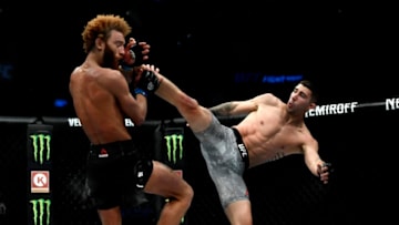 DENVER, CO - NOVEMBER 10: FS1 Main Card Michael Trizano delivers a kick to Luis Pena on his way to winning by split decision in their lightweight 3 round bout during UFC Fight Night Main Card at the Pepsi Center on November 10, 2018 in Denver, Colorado. (Photo by Joe Amon/The Denver Post via Getty Images)