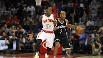 Nov 4, 2015; Atlanta, GA, USA; Atlanta Hawks guard Dennis Schroder (17) defends Brooklyn Nets guard Jarrett Jack (2) in the first quarter at Philips Arena. Mandatory Credit: Brett Davis-USA TODAY Sports