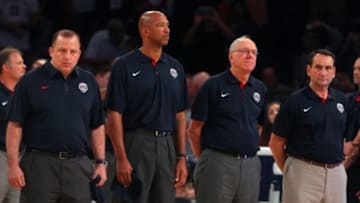 Aug 22, 2014; New York, NY, USA; United States assistant coach Tom Thibodeau (left to right) and assistant coach Monty Williams and assistant coach Jim Boeheim and head coach Mike Krzyzewski stand for the Puerto Rican national anthem before the first quarter of a game against Puerto Rico at Madison Square Garden. Mandatory Credit: Brad Penner-USA TODAY Sports