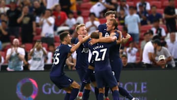 SINGAPORE, SINGAPORE - JULY 21: Harry Kane (1st R) of Tottenham Hotspur celebrates scoring his side's third goal with his team mates during the International Champions Cup match between Juventus and Tottenham Hotspur at the Singapore National Stadium on July 21, 2019 in Singapore. (Photo by Yong Teck Lim/International Champions Cup/Getty Images)