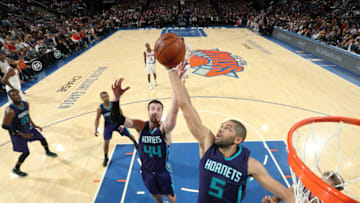 NEW YORK CITY - NOVEMBER 25: Nicolas Batum #5 and Frank Kaminsky III #44 of the Charlotte Hornets go up for a rebound against the New York Knicks at Madison Square Garden in New York, New York. NOTE TO USER: User expressly acknowledges and agrees that, by downloading and/or using this Photograph, user is consenting to the terms and conditions of the Getty Images License Agreement. Mandatory Copyright Notice: Copyright 2016 NBAE (Photo by Nathaniel S. Butler/NBAE via Getty Images)