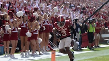Oct 3, 2015; Norman, OK, USA; Oklahoma Sooners wide receiver Sterling Shepard (3) scores a touchdown against the West Virginia Mountaineers in the second quarter at Gaylord Family - Oklahoma Memorial Stadium. Mandatory Credit: Mark D. Smith-USA TODAY Sports