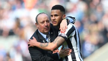 NEWCASTLE UPON TYNE, ENGLAND - APRIL 15: Rafael Benitez, Manager of Newcastle United and Jamaal Lascelles of Newcastle United hug each other after the Premier League match between Newcastle United and Arsenal at St. James Park on April 15, 2018 in Newcastle upon Tyne, England. (Photo by Alex Livesey/Getty Images)