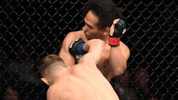 PRAGUE, CZECH REPUBLIC - FEBRUARY 23: (L-R) Petr Yan of Russia punches John Dodson in their bantamweight bout during the UFC Fight Night event at O2 Arena on February 23, 2019 in the Prague, Czech Republic. (Photo by Jeff Bottari/Zuffa LLC/Zuffa LLC via Getty Images)